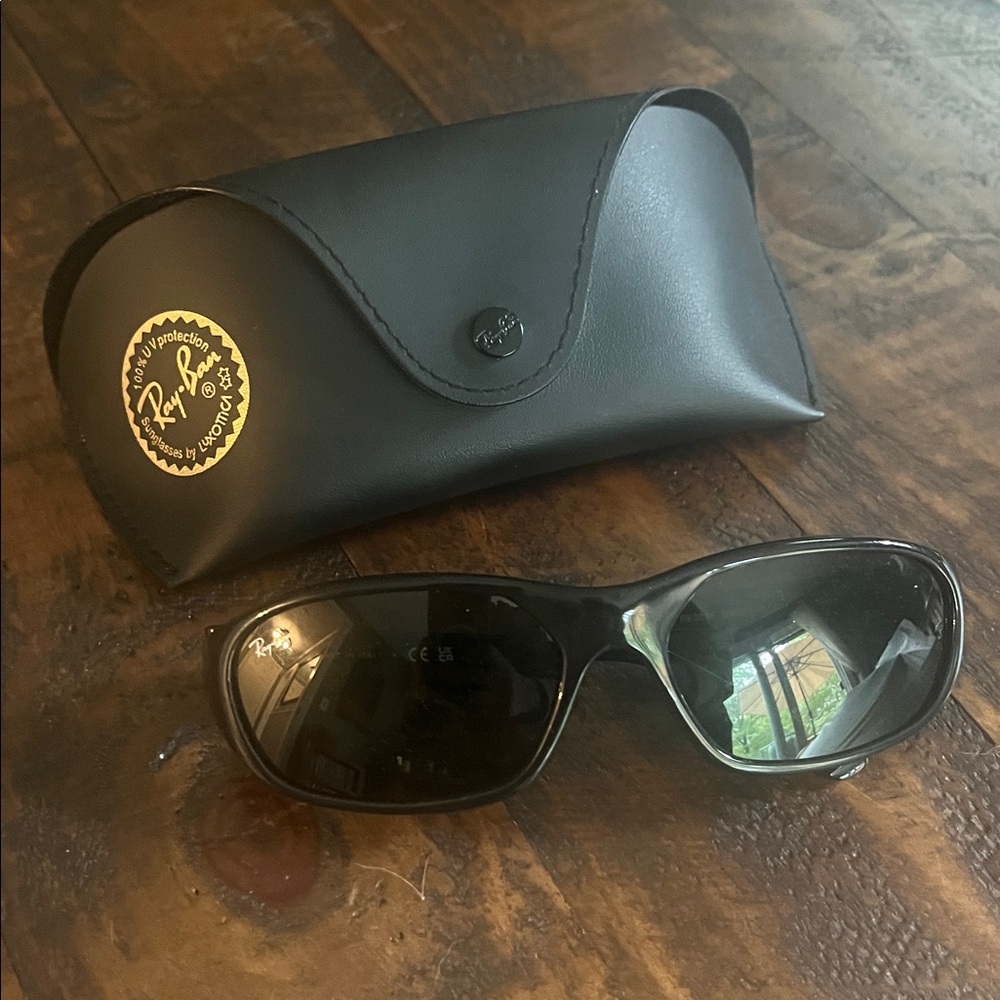 Ray-Ban Black Frame Sunglasses with Dark Lenses